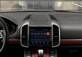 Подержанный автомобиль Porsche Cayenne 2015 года (13 фото)