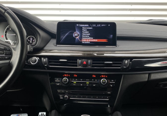 Подержанный автомобиль BMW X6 2016 года (14 фото)