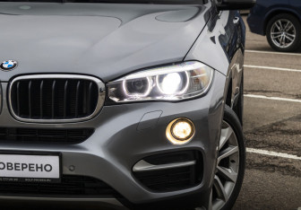 Подержанный автомобиль BMW X6 2019 года (2 фото)