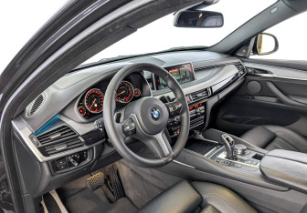 Подержанный автомобиль BMW X6 2018 года (16 фото)
