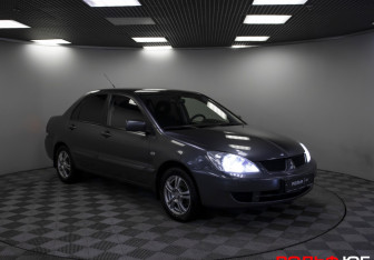 Подержанный автомобиль Mitsubishi Lancer Sedan 2009 года (19 фото)