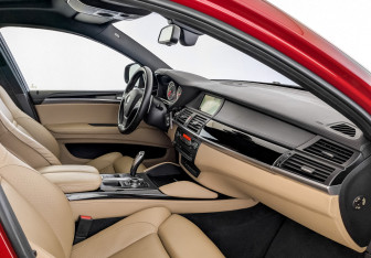 Подержанный автомобиль BMW X6 M 2011 года (10 фото)