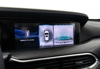 Подержанный автомобиль FAW Bestune T77 2023 года (11 фото)