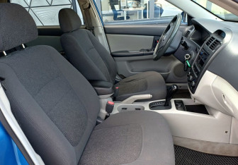 Подержанный автомобиль Kia Cerato Hatchback 2006 года (17 фото)