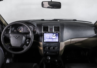 Подержанный автомобиль УАЗ Patriot 2013 года (12 фото)