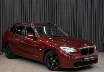 Подержанный автомобиль BMW X1 2011 года (7 фото)