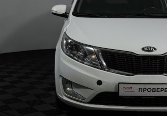 Подержанный автомобиль Kia Rio Hatchback 2013 года (15 фото)