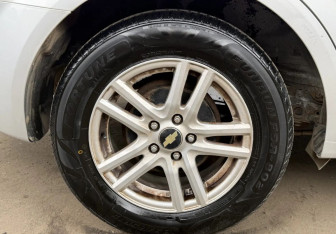 Подержанный автомобиль Chevrolet Aveo Sedan 2012 года (14 фото)
