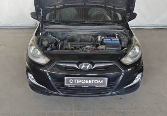 Подержанный автомобиль Hyundai Solaris Hatchback 2013 года (15 фото)