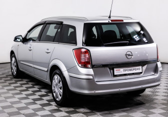 Подержанный автомобиль Opel Astra Wagon 2014 года (7 фото)