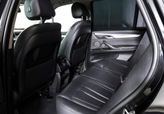 Подержанный автомобиль BMW X5 2014 года (12 фото)