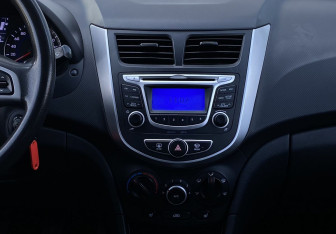 Подержанный автомобиль Hyundai Solaris Sedan 2013 года (11 фото)