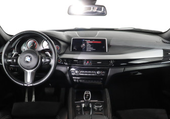 Подержанный автомобиль BMW X6 2016 года (10 фото)