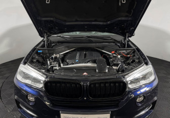 Подержанный автомобиль BMW X5 2014 года (10 фото)