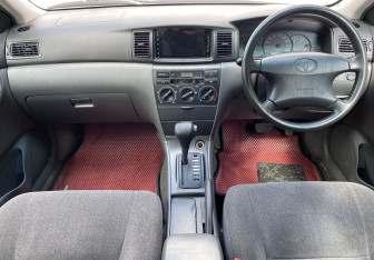 Подержанный автомобиль Toyota Corolla Sedan 2002 года (11 фото)