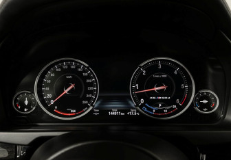 Подержанный автомобиль BMW X6 2016 года (13 фото)