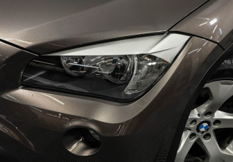 Подержанный автомобиль BMW X1 2014 года (7 фото)