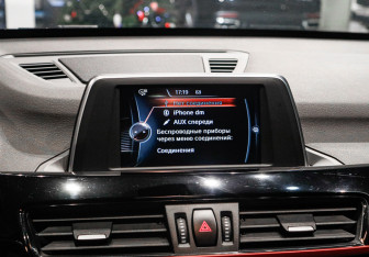 Подержанный автомобиль BMW X1 2016 года (19 фото)