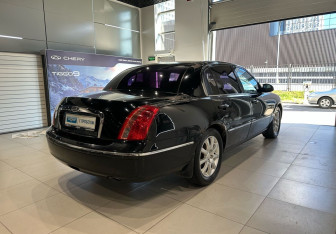 Подержанный автомобиль Kia Opirus 2008 года (4 фото)