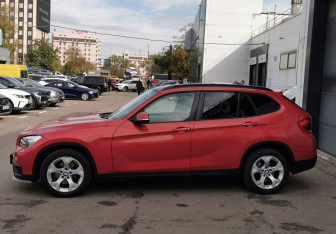 Подержанный автомобиль BMW X1 2014 года (8 фото)