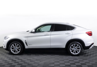 Подержанный автомобиль BMW X6 2016 года (8 фото)