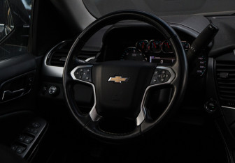 Подержанный автомобиль Chevrolet Tahoe 2016 года (14 фото)