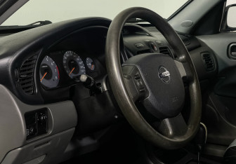Подержанный автомобиль Nissan Almera Classic 2012 года (13 фото)