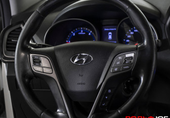 Подержанный автомобиль Hyundai Santa Fe 2014 года (14 фото)