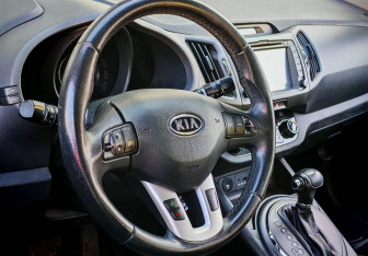 Подержанный автомобиль Kia Sportage 2011 года (10 фото)