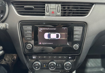 Подержанный автомобиль Skoda Octavia Liftback 2013 года (14 фото)