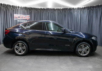 Подержанный автомобиль BMW X6 2019 года (4 фото)