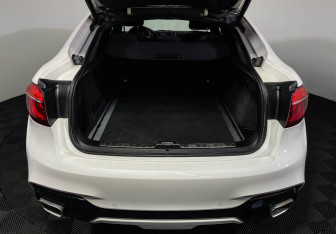 Подержанный автомобиль BMW X6 2016 года (9 фото)