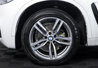 Подержанный автомобиль BMW X6 2018 года (19 фото)