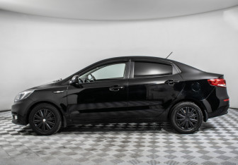 Подержанный автомобиль Kia Rio Sedan 2015 года (8 фото)