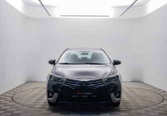 Подержанный автомобиль Toyota Corolla Sedan 2014 года (2 фото)