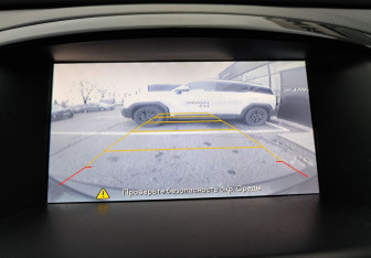 Подержанный автомобиль Opel Astra Sedan 2014 года (14 фото)