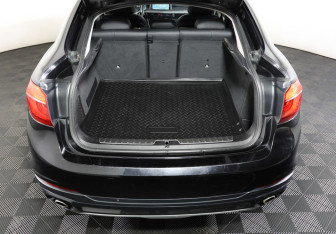 Подержанный автомобиль BMW X6 2015 года (10 фото)