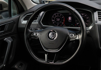 Подержанный автомобиль Volkswagen Tiguan 2018 года (11 фото)