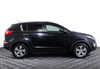Подержанный автомобиль Kia Sportage 2013 года (4 фото)