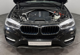 Подержанный автомобиль BMW X6 2015 года (10 фото)