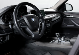 Подержанный автомобиль BMW X5 2014 года (14 фото)