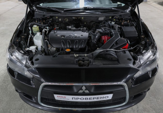 Подержанный автомобиль Mitsubishi Lancer Sedan 2012 года (9 фото)