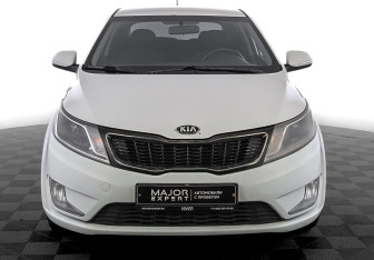 Подержанный автомобиль Kia Rio Hatchback 2014 года (2 фото)