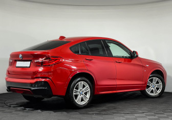 Подержанный автомобиль BMW X4 2015 года (2 фото)