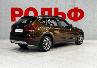 Подержанный автомобиль BMW X1 2013 года (5 фото)