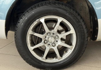 Подержанный автомобиль Toyota Corolla Spacio 1998 года (9 фото)