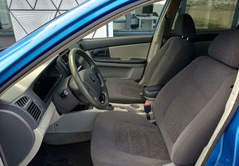 Подержанный автомобиль Kia Cerato Hatchback 2006 года (16 фото)
