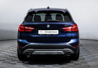 Подержанный автомобиль BMW X1 2015 года (6 фото)