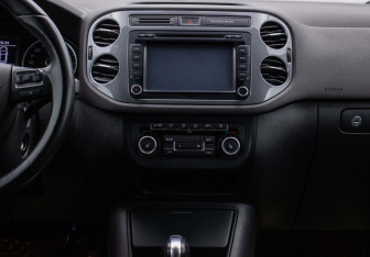 Подержанный автомобиль Volkswagen Tiguan 2014 года (14 фото)