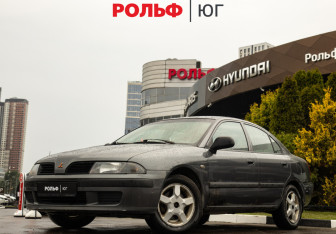 Подержанный автомобиль Mitsubishi Carisma Sedan 2002 года (8 фото)
